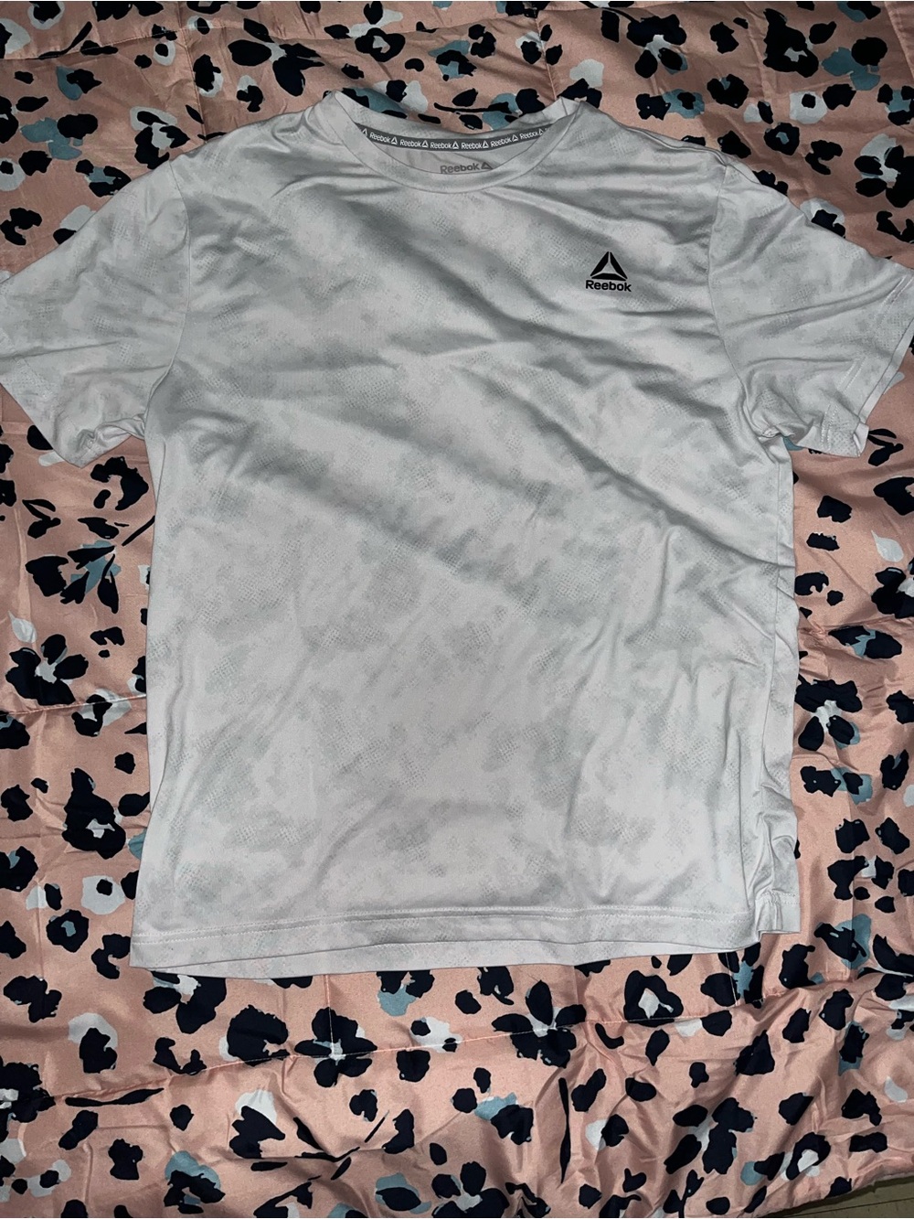 Reebok Men’s White Short Sleeve Athletic Tee with Black Logo